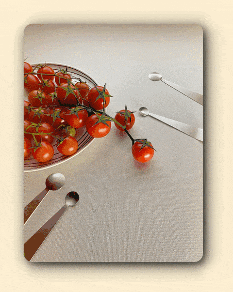 gif of stainless steel Dome tongs lifting baby tomato from plate of baby tomatoes