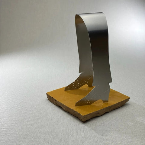 The Tap Shoe serving tongs