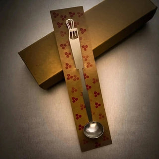Bentwood stainless steel tiny serving ladle presented in a hand-stamped kraft gift box
