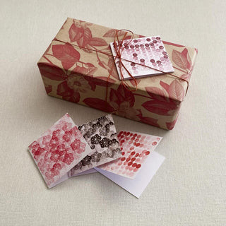 Complimentary between you and me gift wrapping with hand made studio cards and botanical paper