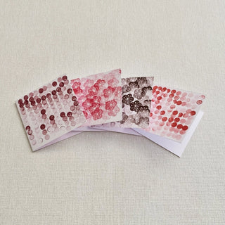 Hand made studio gift cards with stamped floral and dotted patterns for between you and me purchases