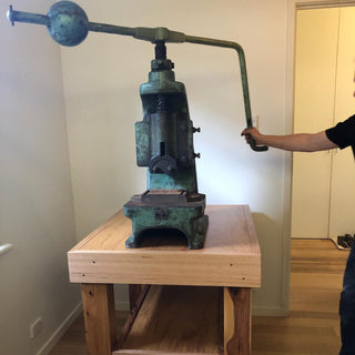 Vintage fly press installed in the Between You and Me studio
