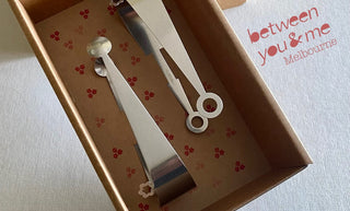 Dome and Circles stainless steel serving pieces presented in kraft gift box with Between You and Me logo