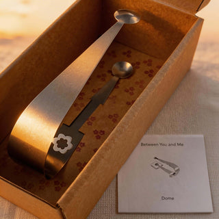 Dome serving piece presented in kraft gift box with floral patterned insert and product card
