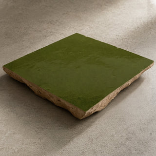 Garden Green handcrafted ceramic table tile showing glossy green surface and natural clay edge