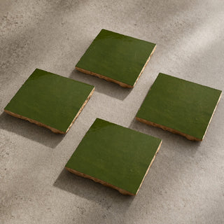Set of four Garden Green handcrafted ceramic table tiles with rich green glaze and raw textured edges
