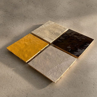 Mixed set of handcrafted ceramic table tiles in Golden Sun, Soft Cream and Cocoa Brown glaze finishes