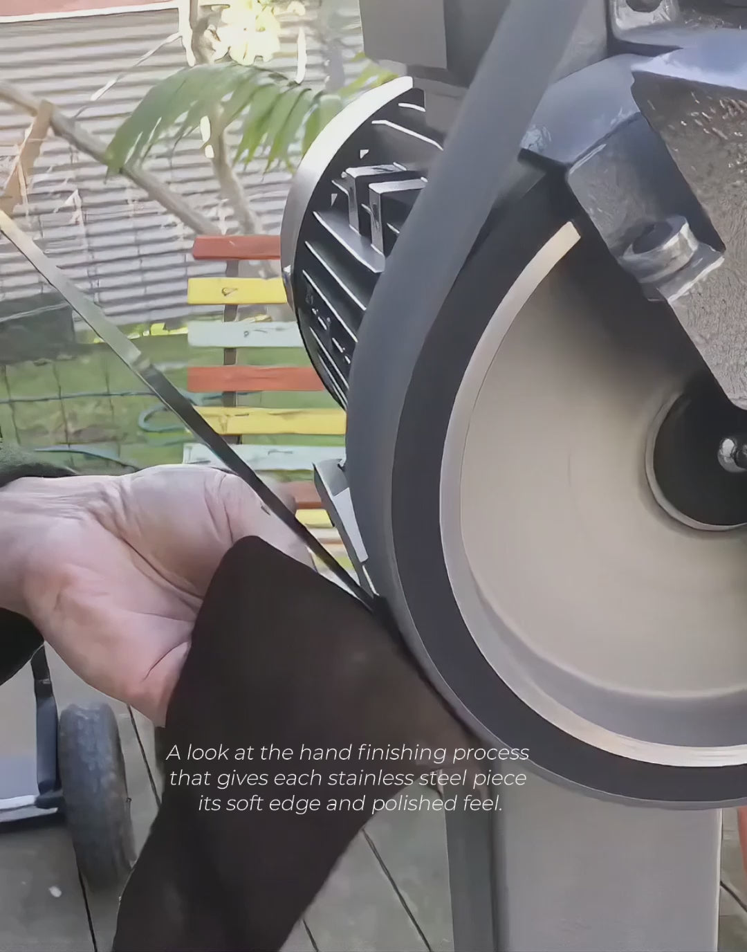 Video showing a stainless steel serving piece being hand finished on a radius machine in the Between You and Me studio.