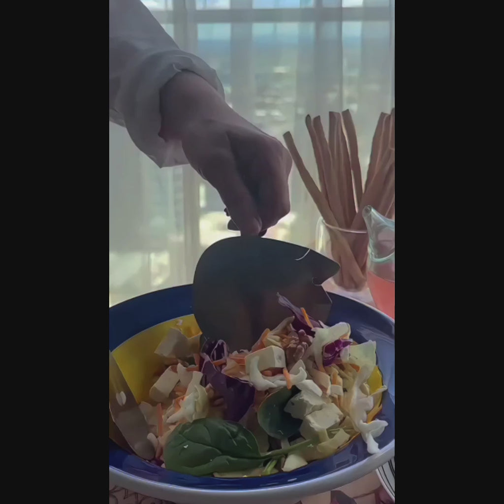 Video showing the sketching, making and use of the Those Two handcrafted stainless steel salad servers, from sculptural face design to serving salad.