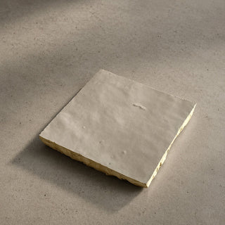 Single Soft Cream ceramic table tile handcrafted in Morocco and hand finished in studio